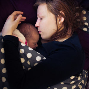 Photo by David Veksler - kissing mother to her child