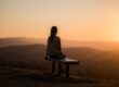 quite girl thinking and seeing sunset